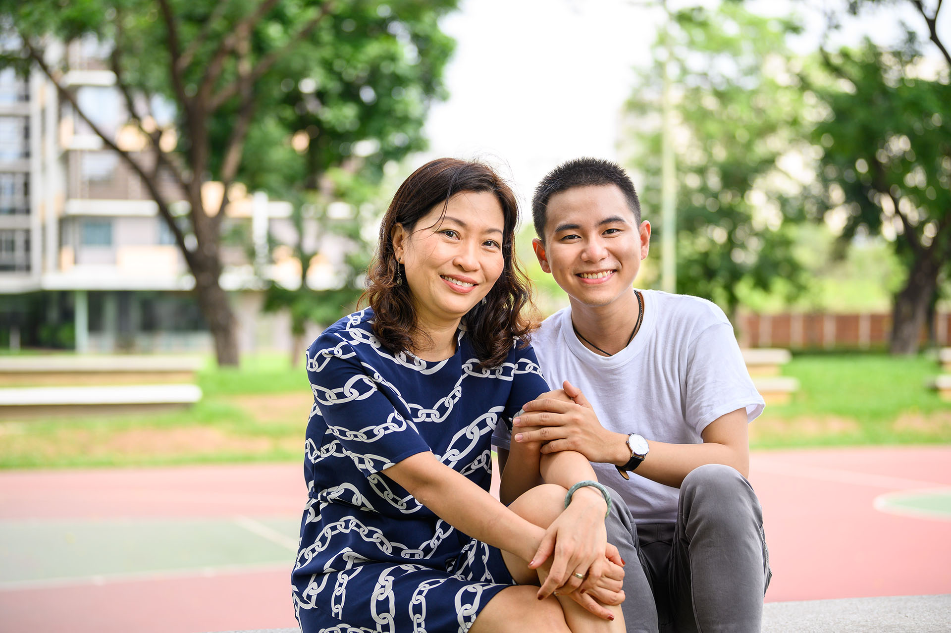 Vietnamese parent and child smiling