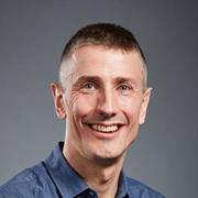 Dr. Chris De Gruyter