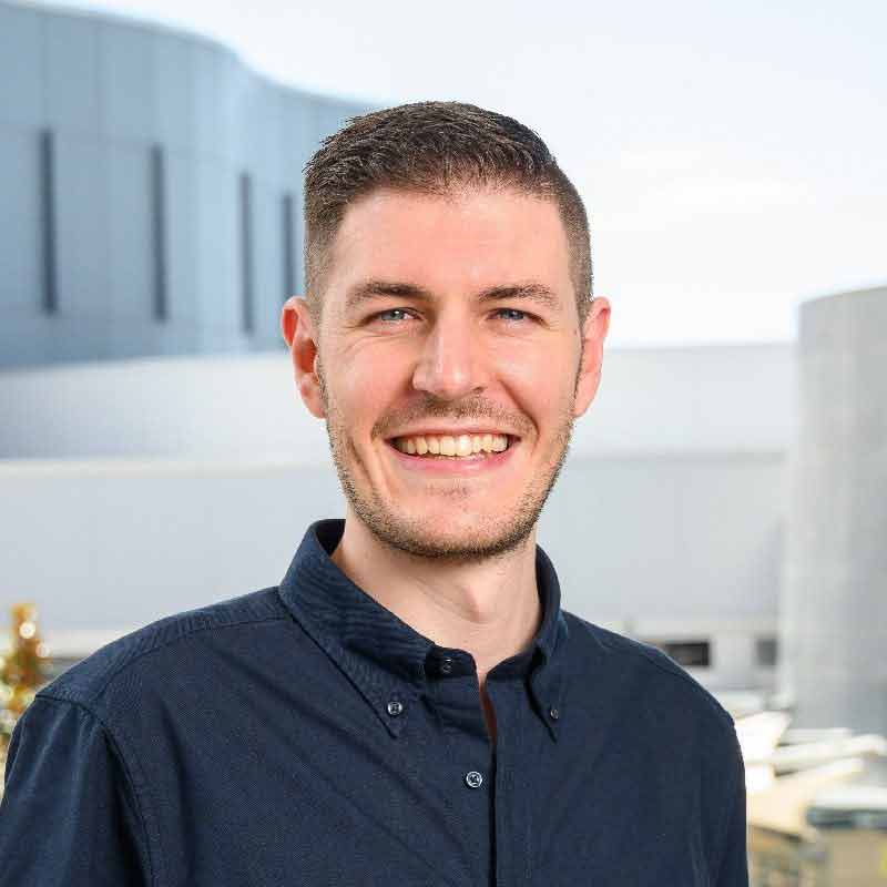 Associate Professor  TJ  Thomson