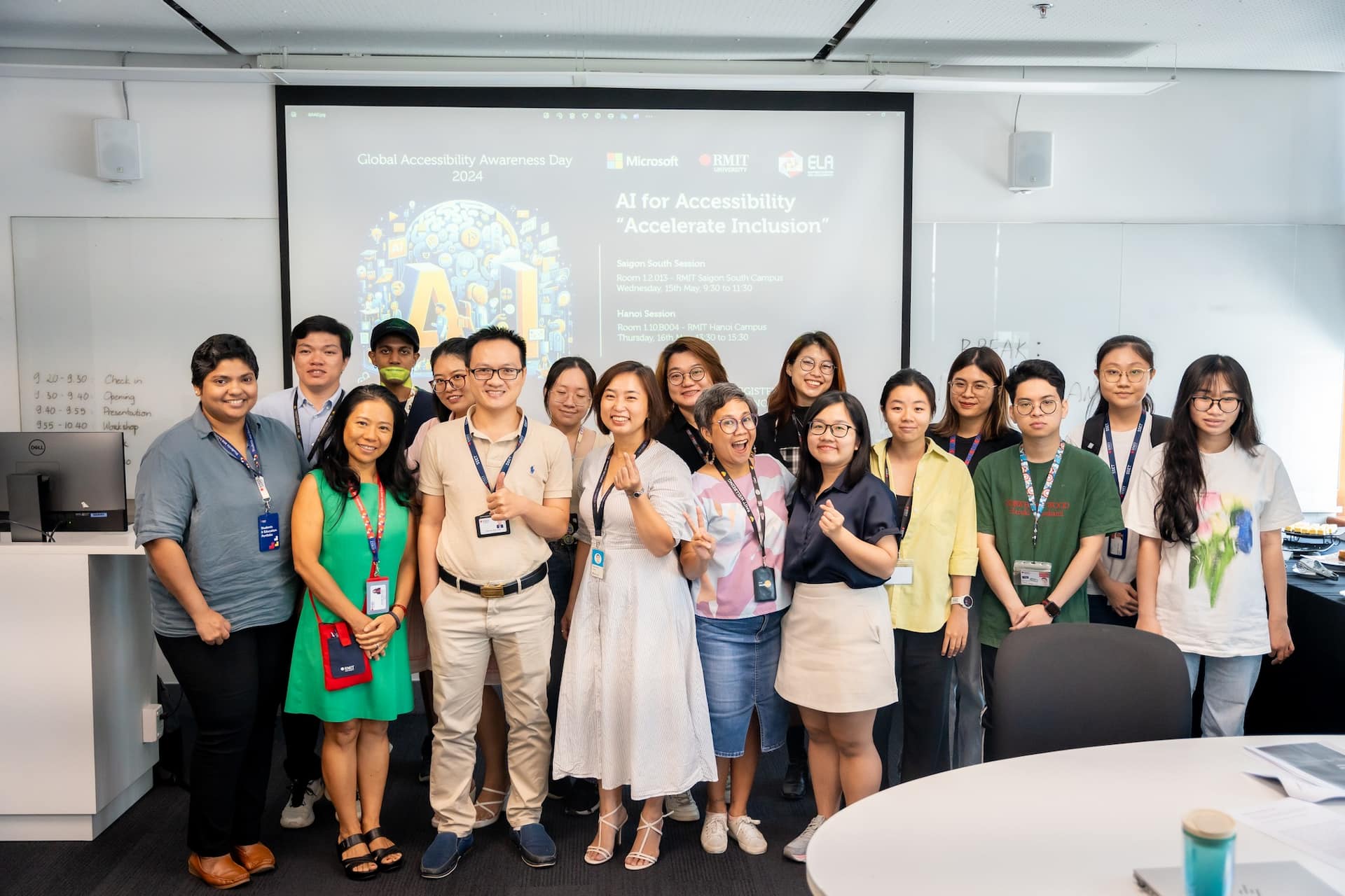 A group of people stand at a workshop.