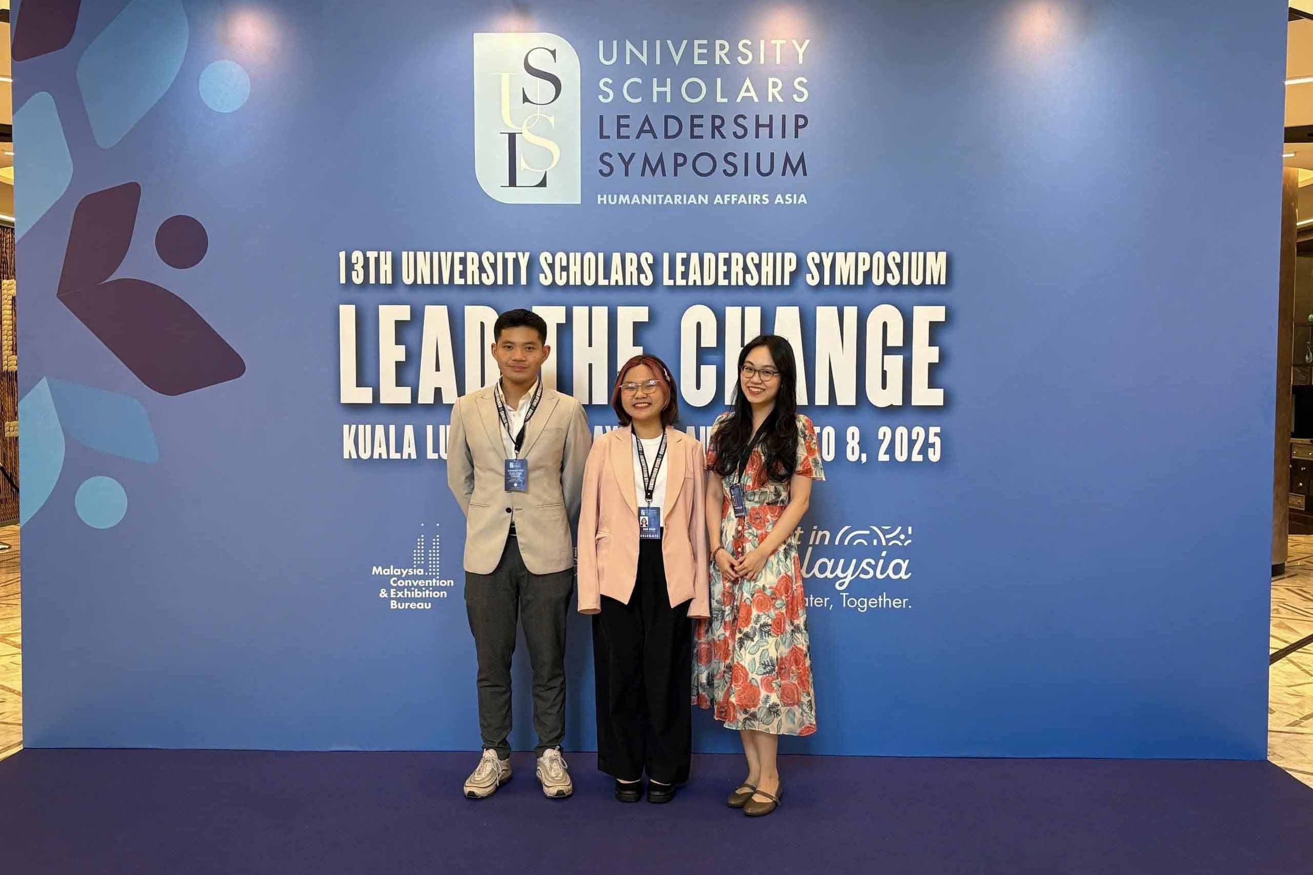 Phuong Do - Student Leadership & Development Program Coordinator with Nghi and Dung at the USLS in Kuala Lumpur, Malaysia. 