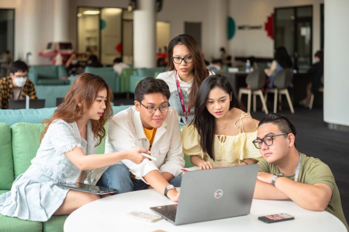 students-looking-at-laptop-together.jpg