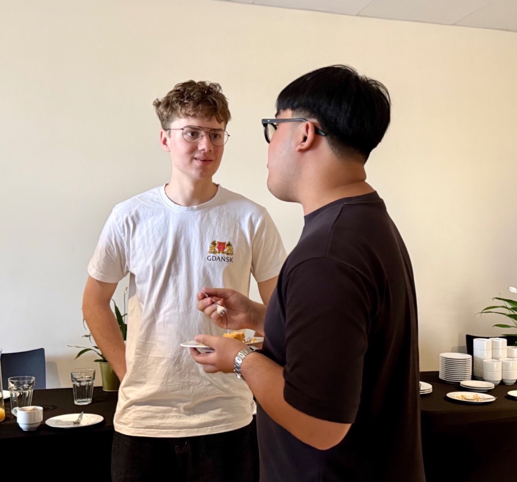 warsaw-study-trip-rmit-vn-two-students-speaking-with-each-other