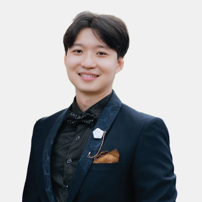 headshot of a man smiling