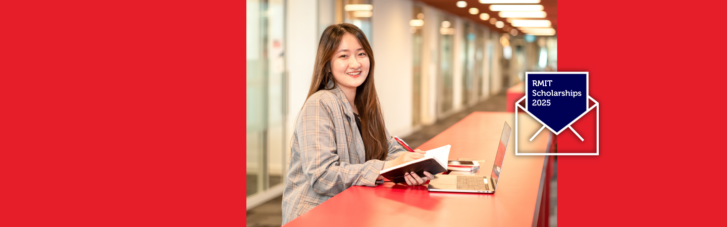 Photo of a female student smiling and holding a book and a pen with an open letter written RMIT scholarships 2025