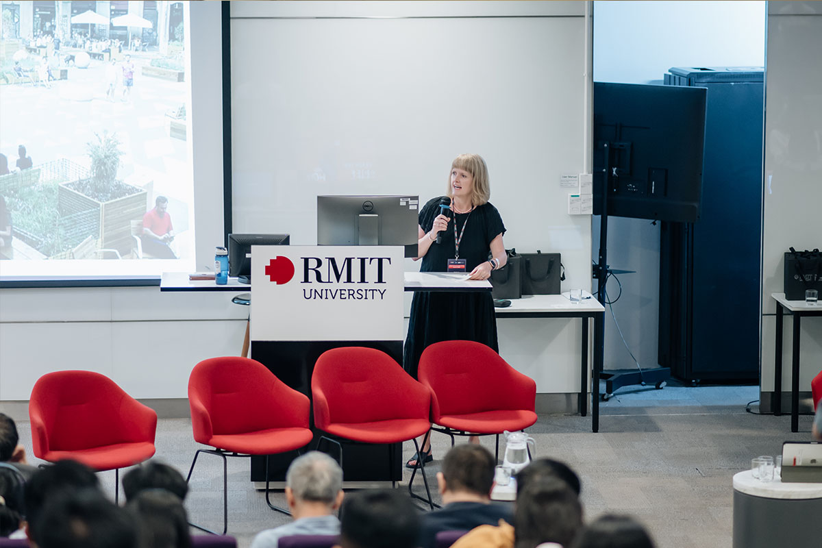 Professor Melanie Davern are sharing on the stage