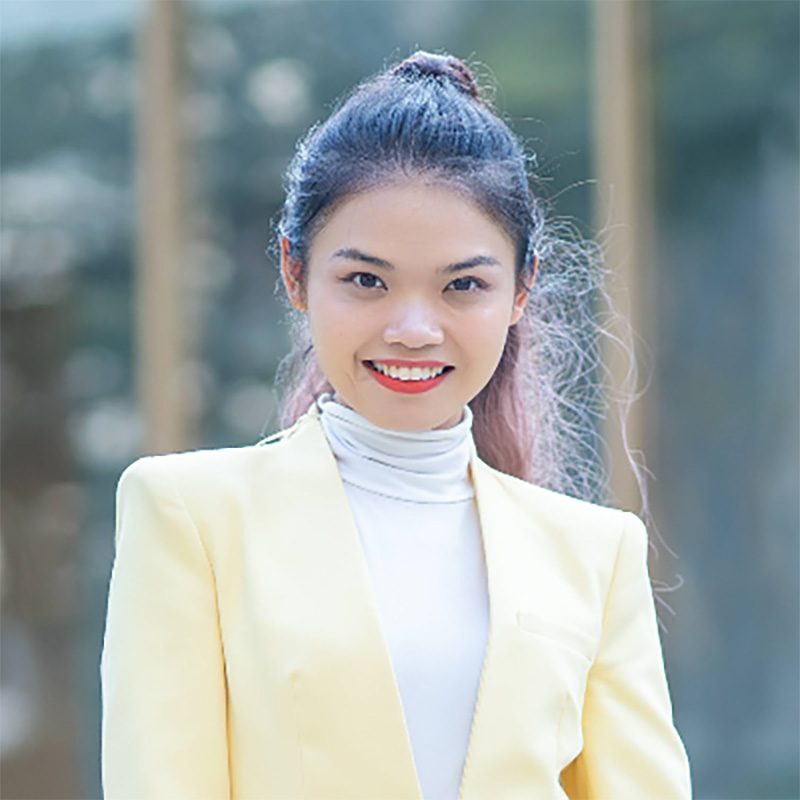 a headshot of a woman smiling 