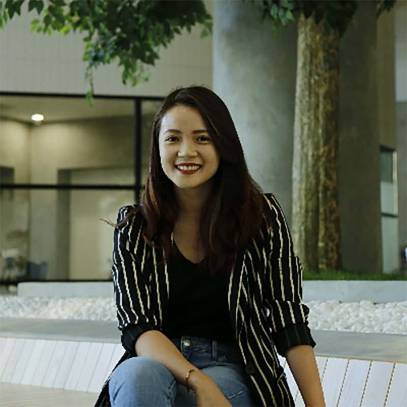 a headshot of a woman smiling 