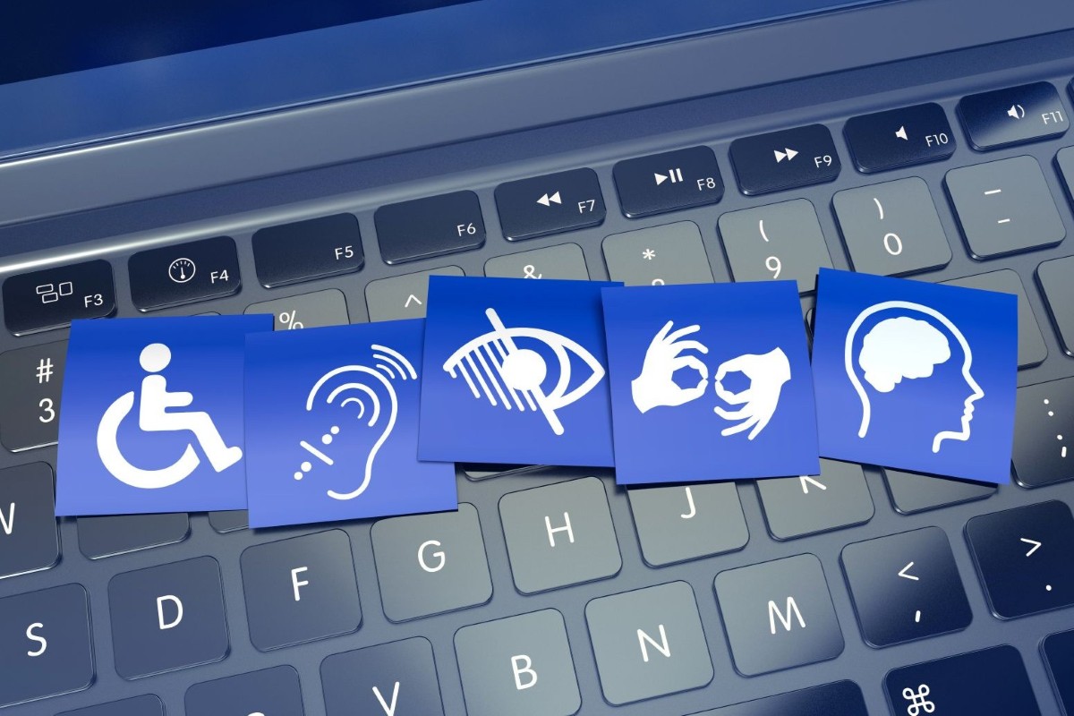 accessibility icons on a laptop keyboard