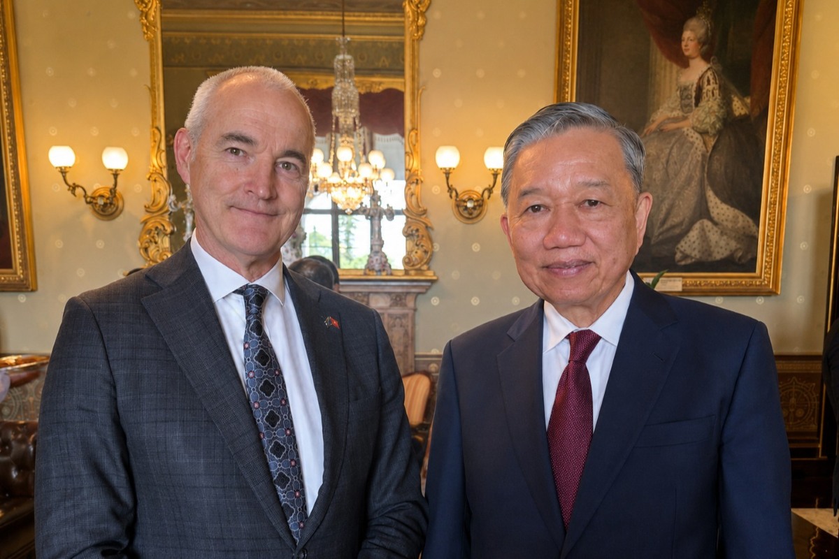 Two men standing next to each other