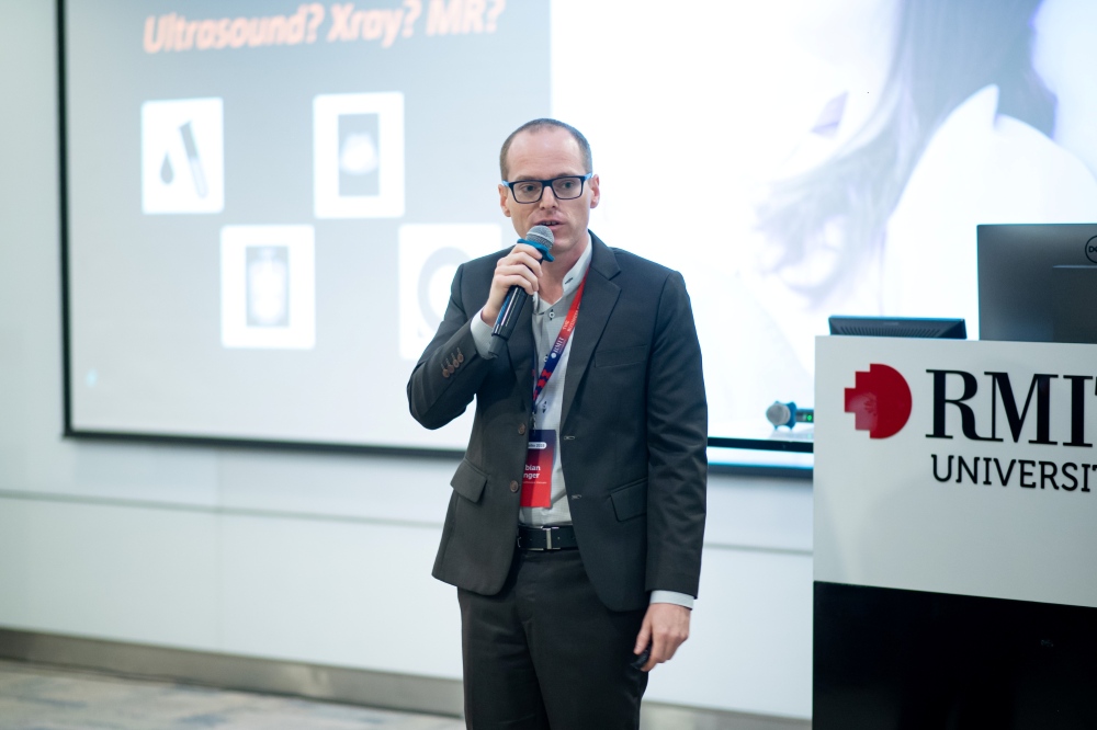 Mr Fabian Singer speaking on stage