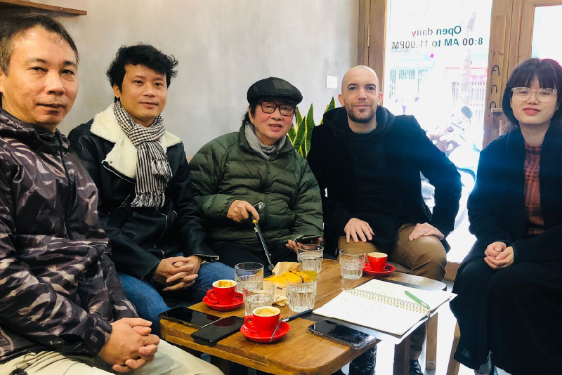 Martino Cipriani (second from right) and director Dang Nhat Minh (middle)