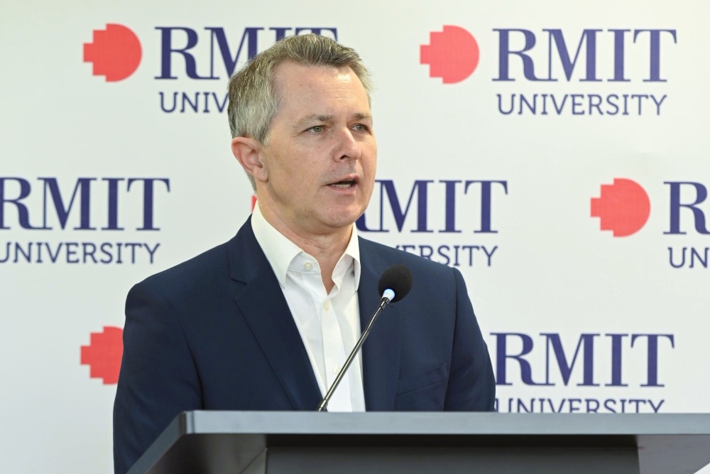 Minister Jason Clare speaking at RMIT's Hanoi campus