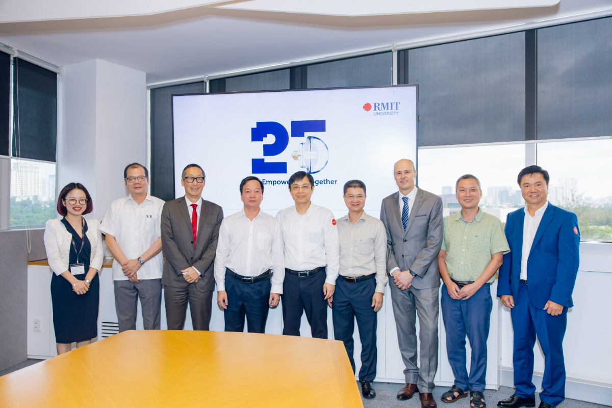 RMIT leadership meets with representatives from the Ministry of Education and Training, the Office of the Government, and participating universities at the conference.