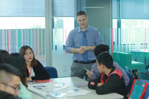 Students learn how businesses use social media from Erik Young, Acting Head of Professional Communication.