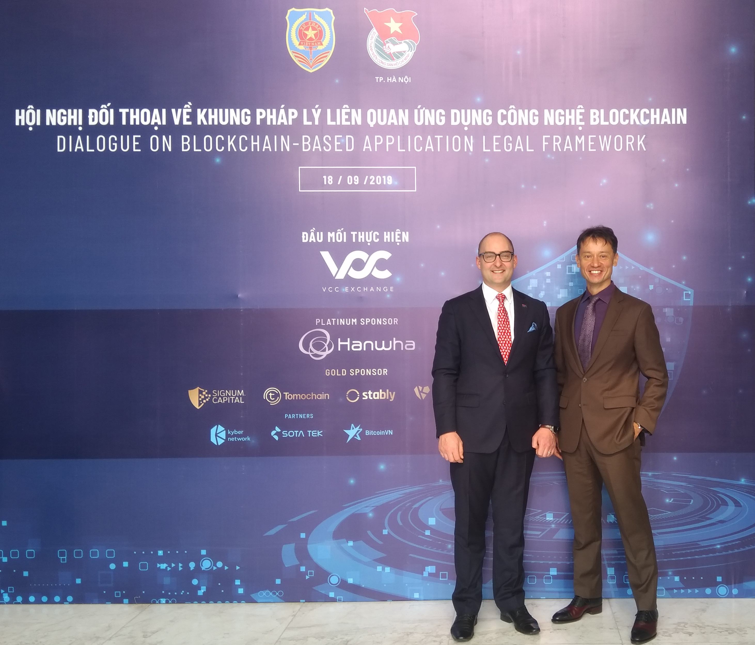 Blockchain Innovation Hub’s Aaron Lane (left) with CODE Director Associate Professor Jerry Watkins (right) at the Ministry of Justice conference.