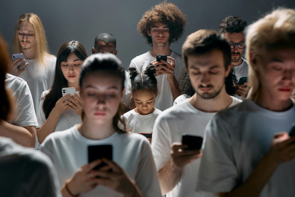 People looking at smartphones