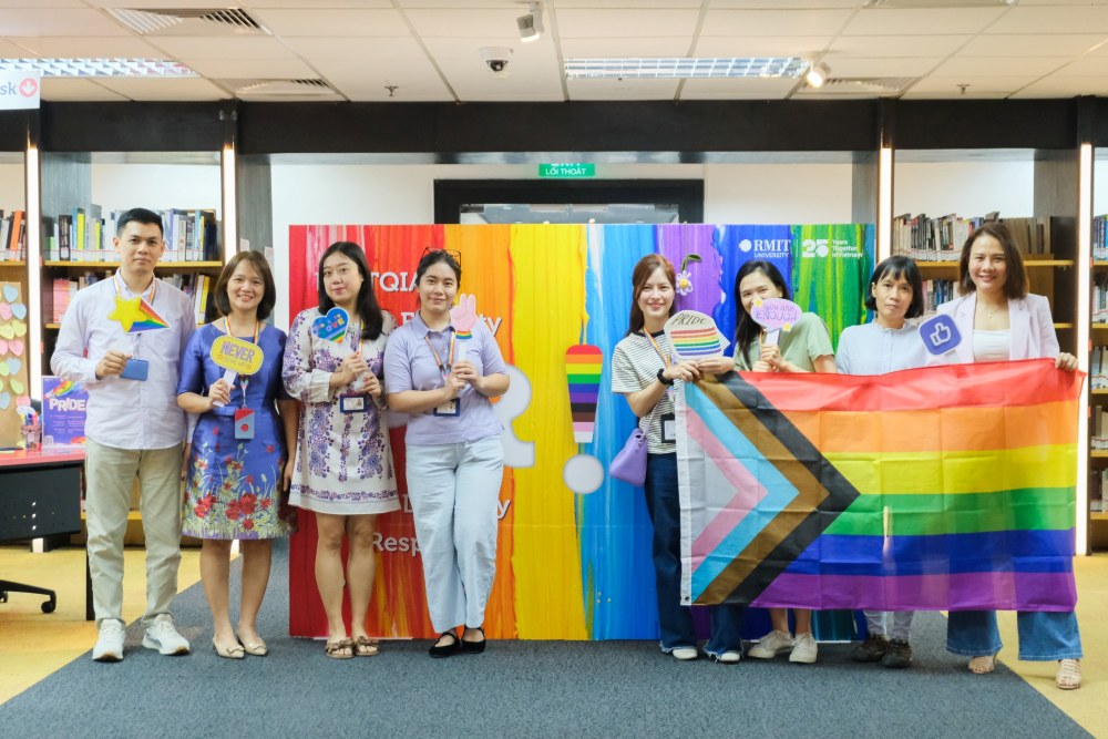 Library staff with Pride flag