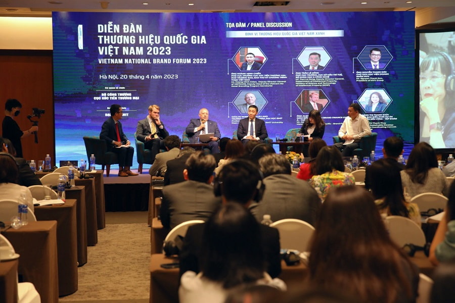 Six panellists on stage at the forum