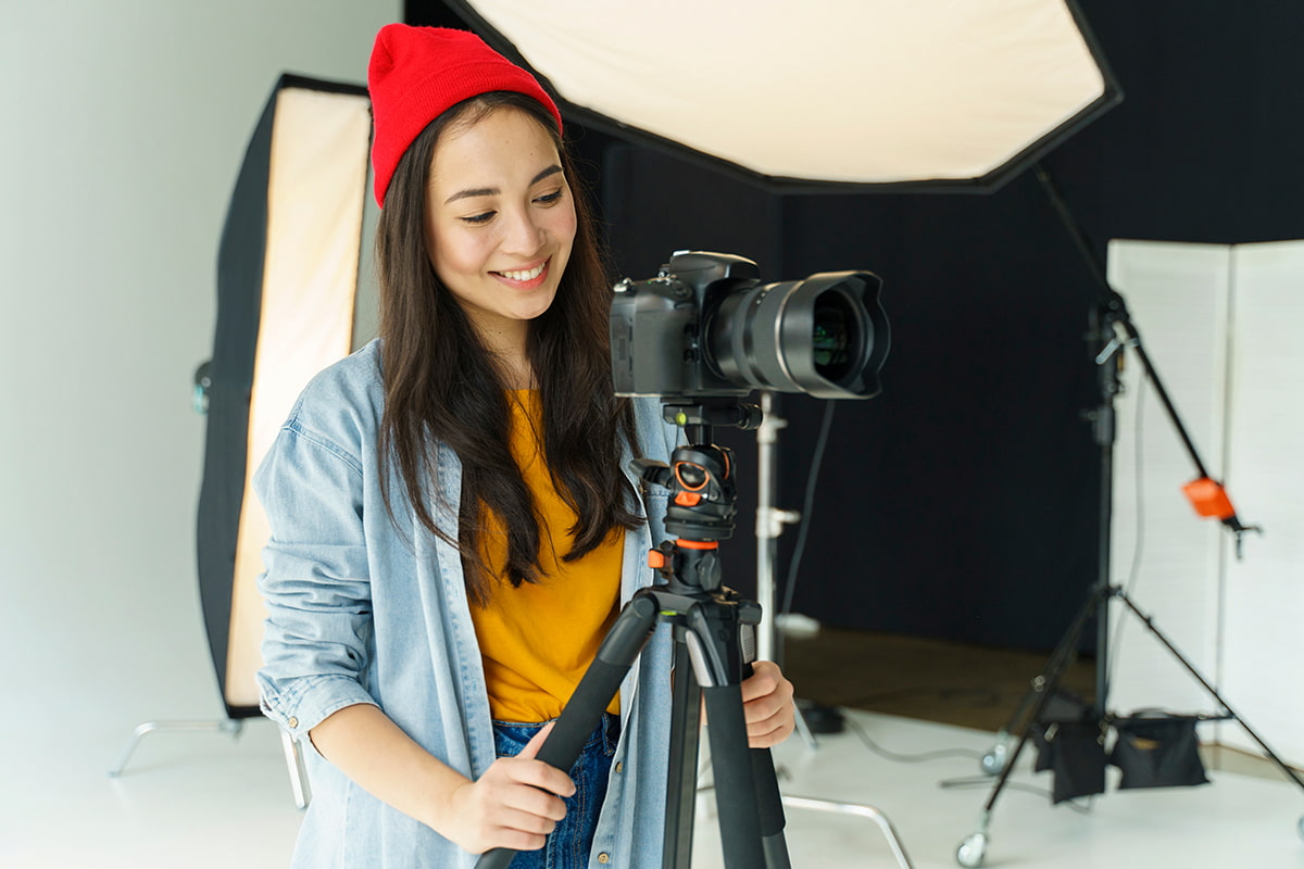 smiley-woman-digital-content-creation-photography-studio-camera.jpg