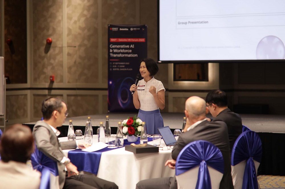 A female speaker at the symposium
