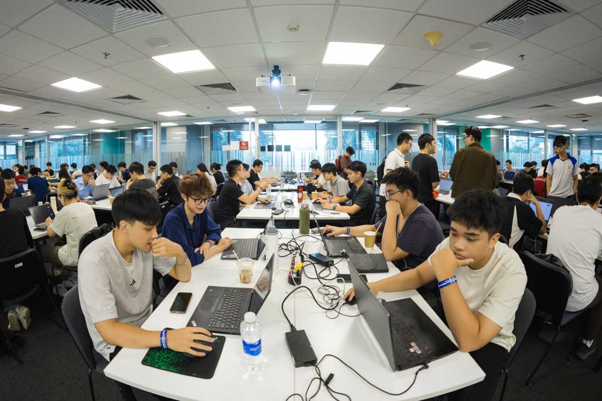 Students sitting at computers during the hackathon