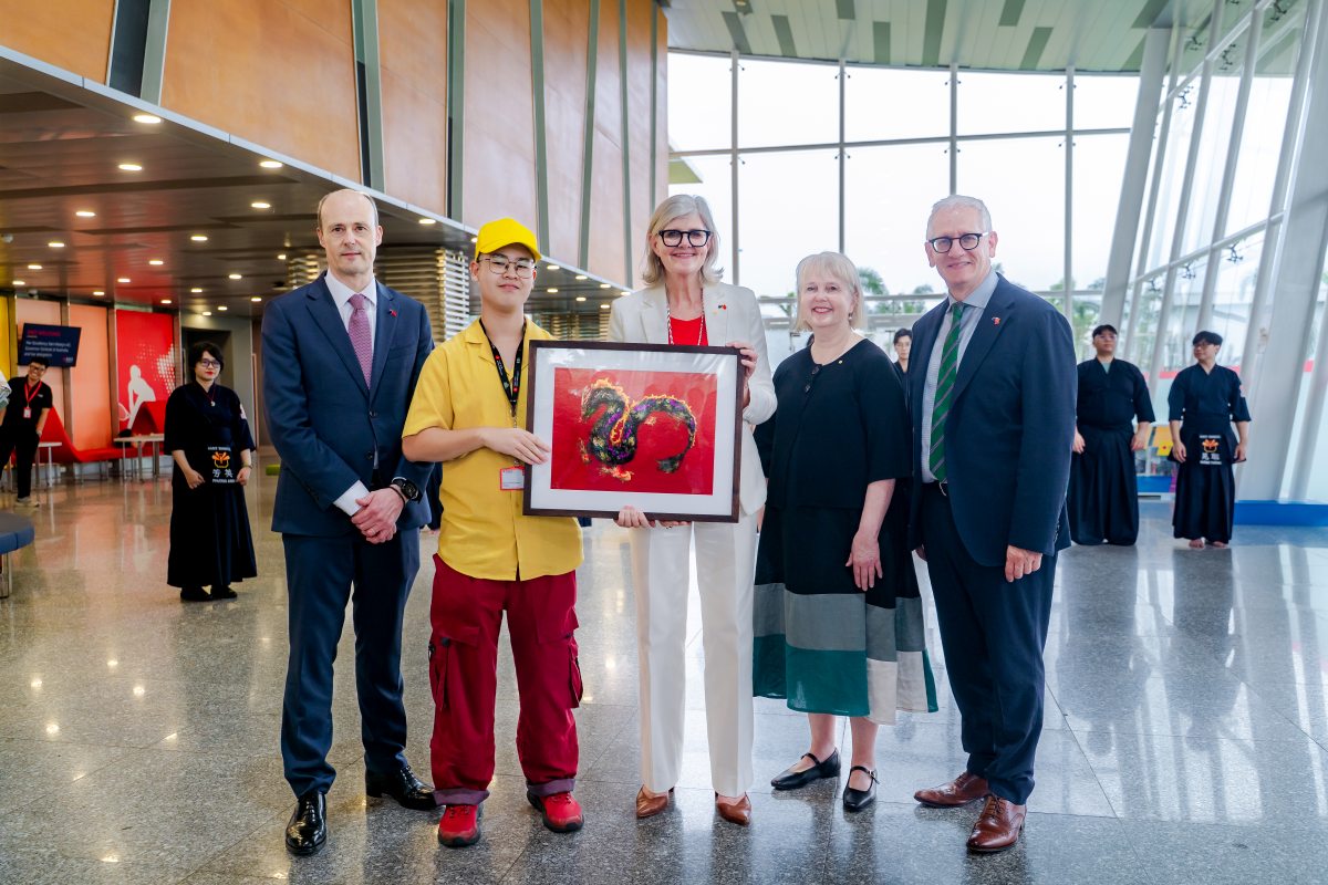 Group photo with gift to Governor-General