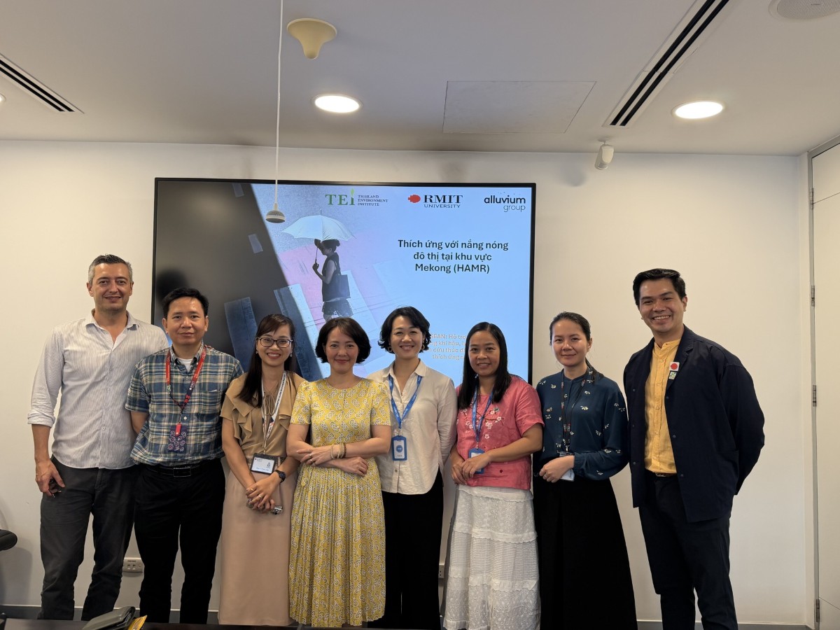 Group photo of eight people