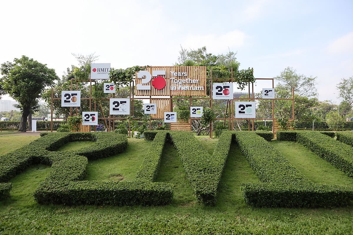 Grass shaped into RMIT logo - RMIT 25 years anniversary