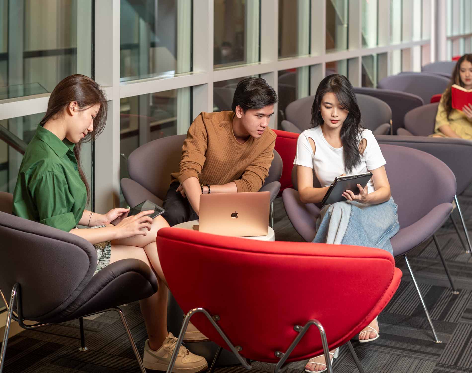 three students hanging out 