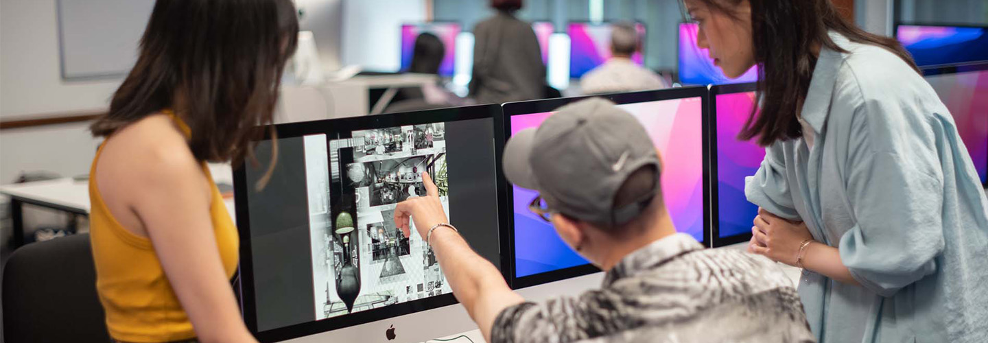 Design students discussing work 