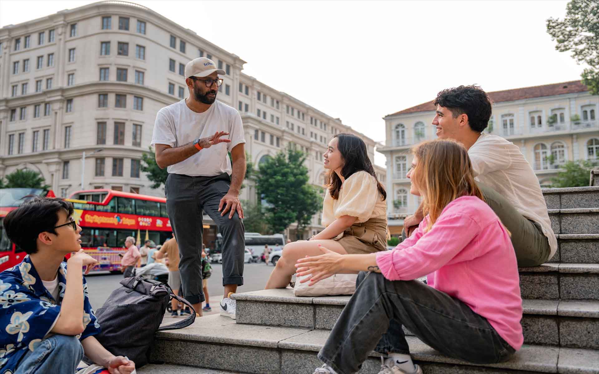 a group of multicultural students talking in street 