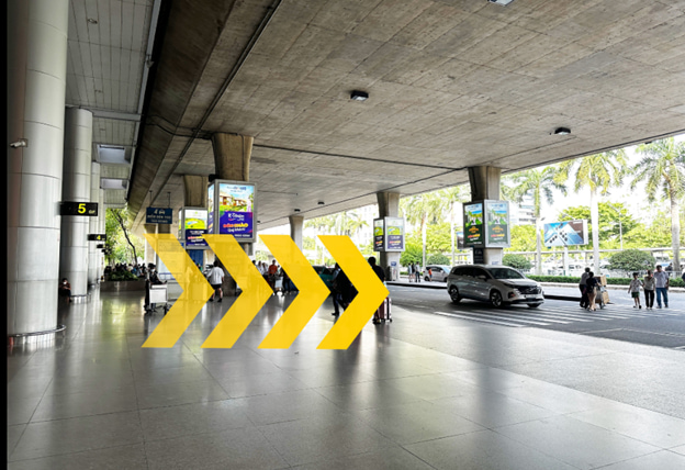yellow arrows superimposed on a photo from the Saigon airport. 