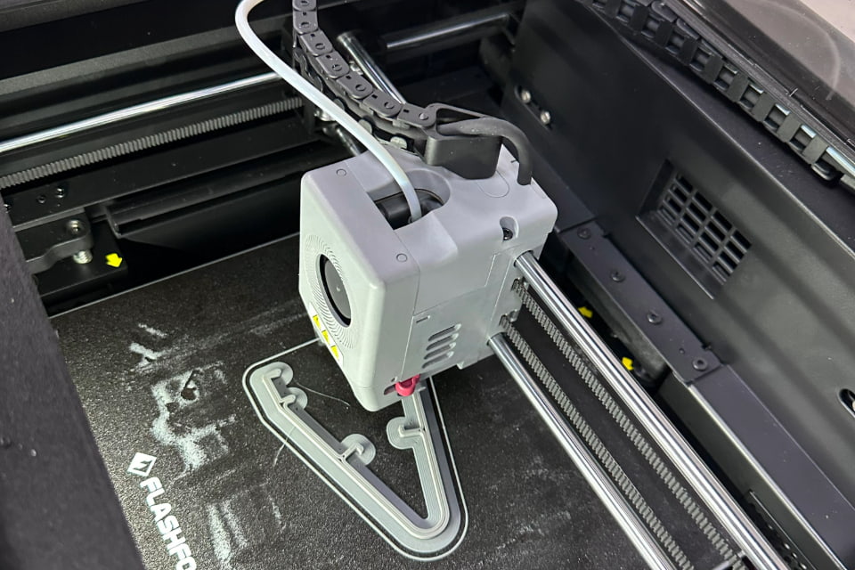 A closeup shot of a CNC machine in RMIT advance manufacturing workshop space