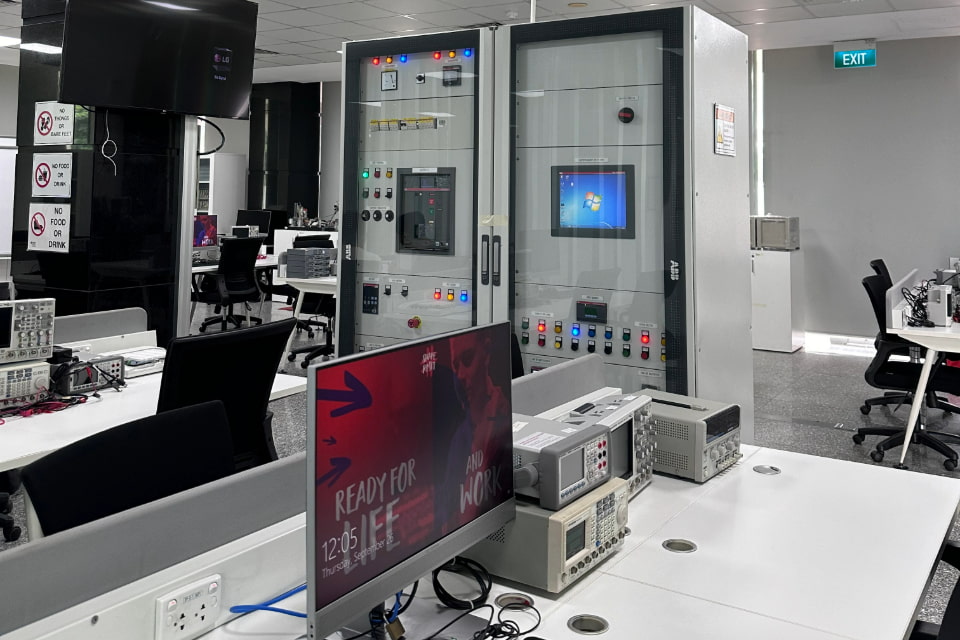Photo of an electronic lab featuring a range of equipment such as the dc power supplies and function generators  
