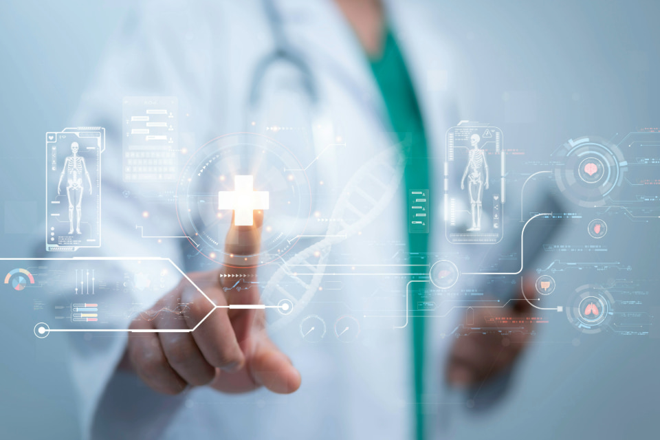 Photo of a healthcare professional interacts with a futuristic digital interface displaying medical icons and data visualizations