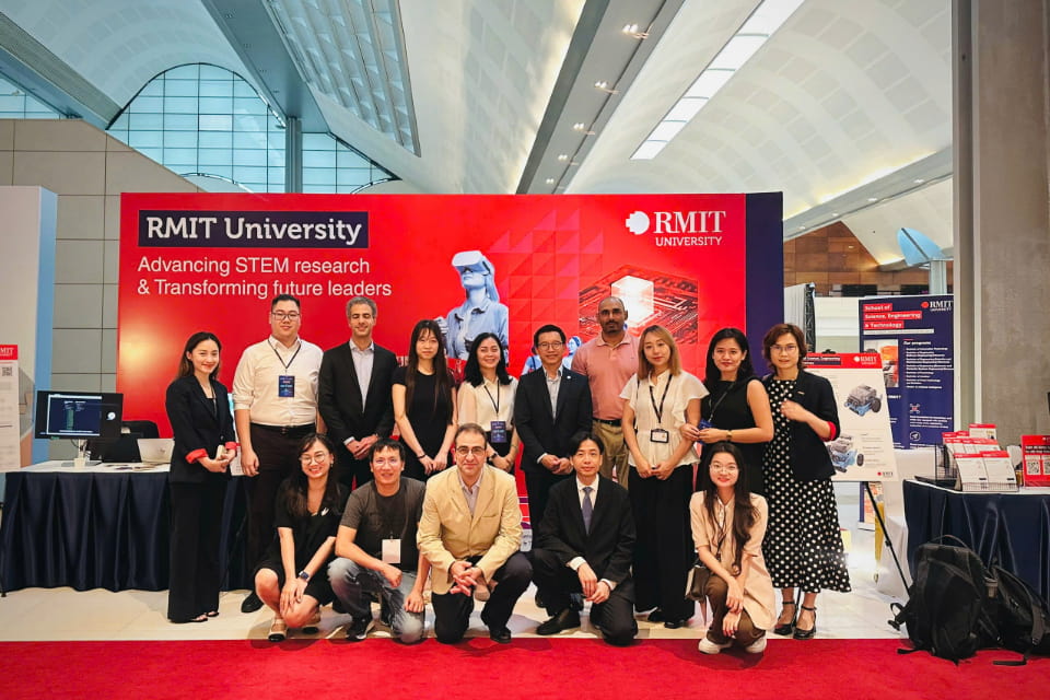 Photo of students and staff from RMIT attending the Advacing STEM research & Transforming future leaders conference