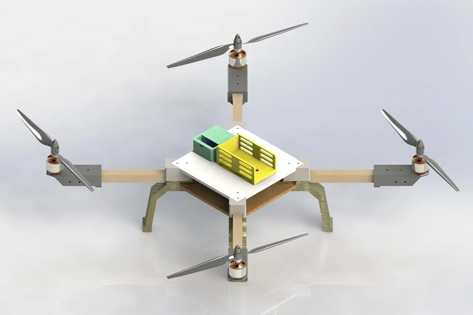 3D rendering of a drone prototype featuring a square frame design with four rotors and a central housing for components.