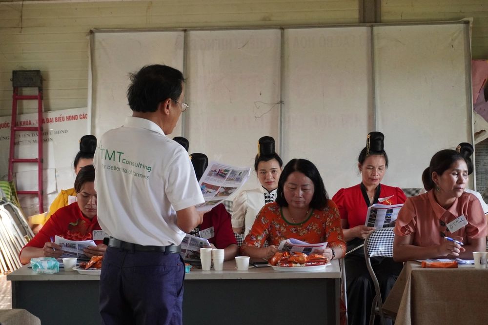 Coffee workers receiving workplace safety training and guidance