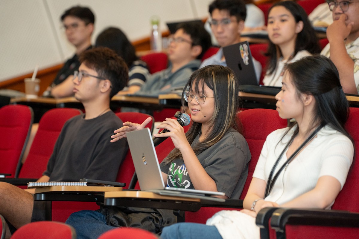 Students actively engage by asking questions during the session