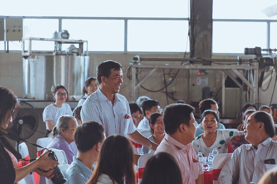 Puratos representatives and cocoa farmers