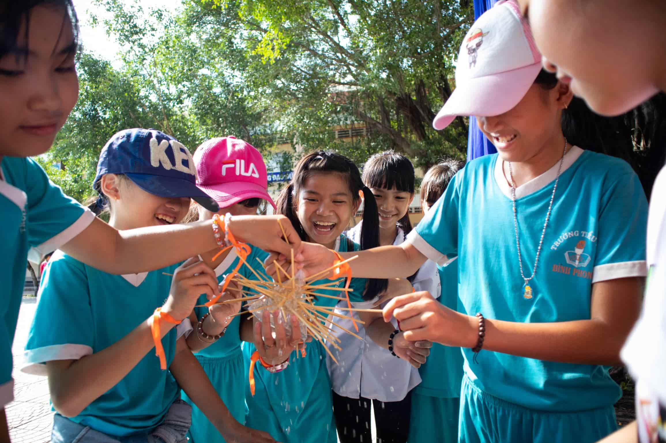 Primary school girls excitedly joined group activity