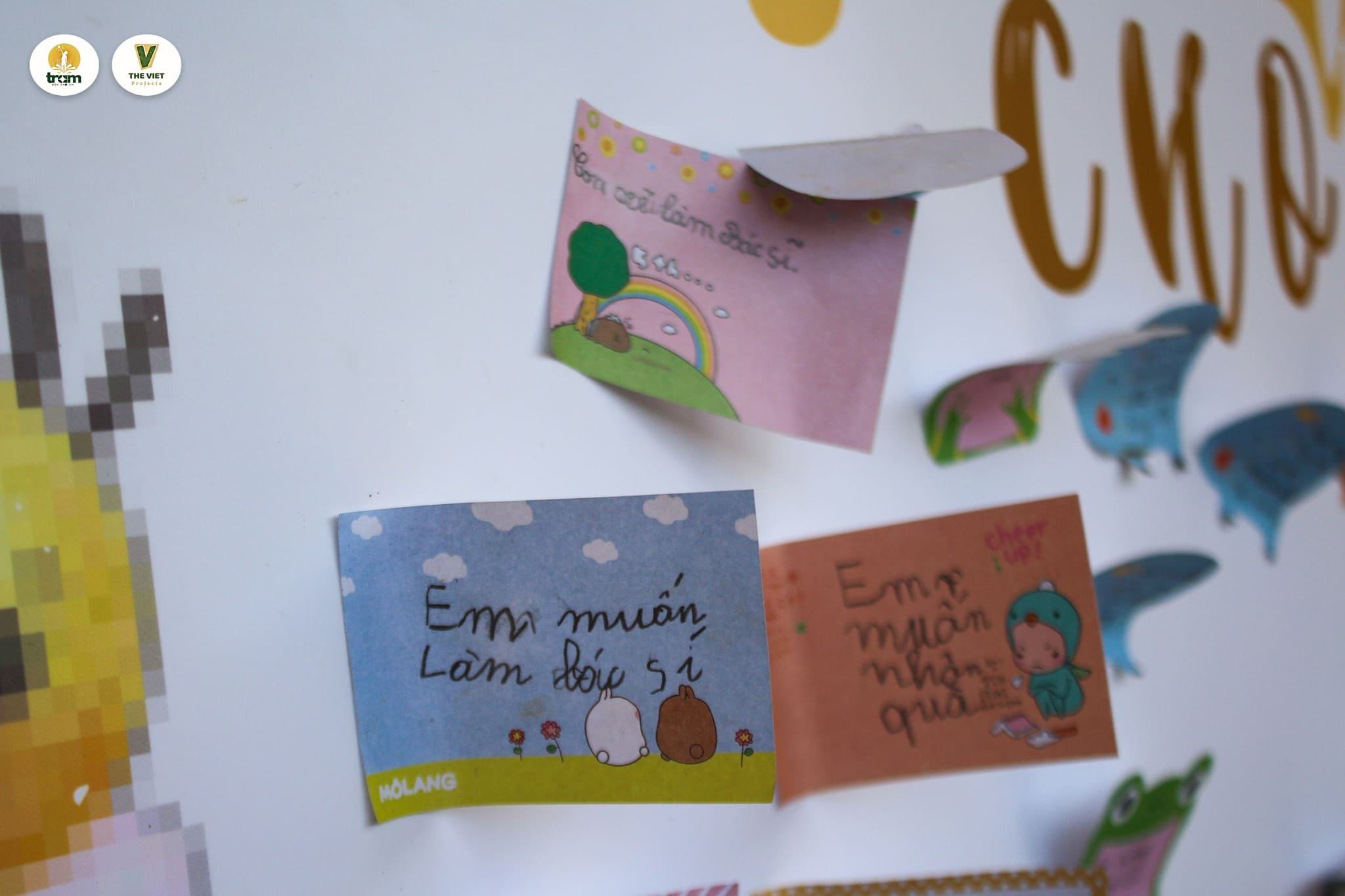Children’s wish notes on display board