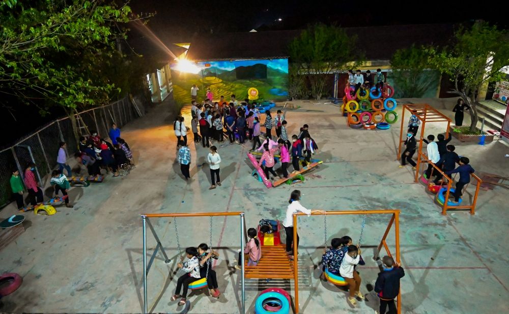 Wheel of Dreams community playground event at night