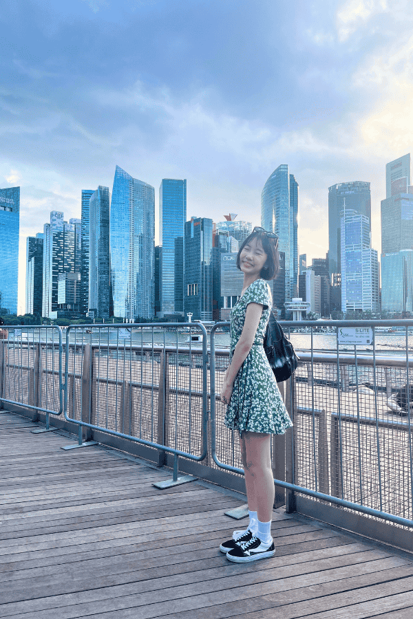 rmit-student-trang-luu-standing-in-front-of-singapore-skyline.png