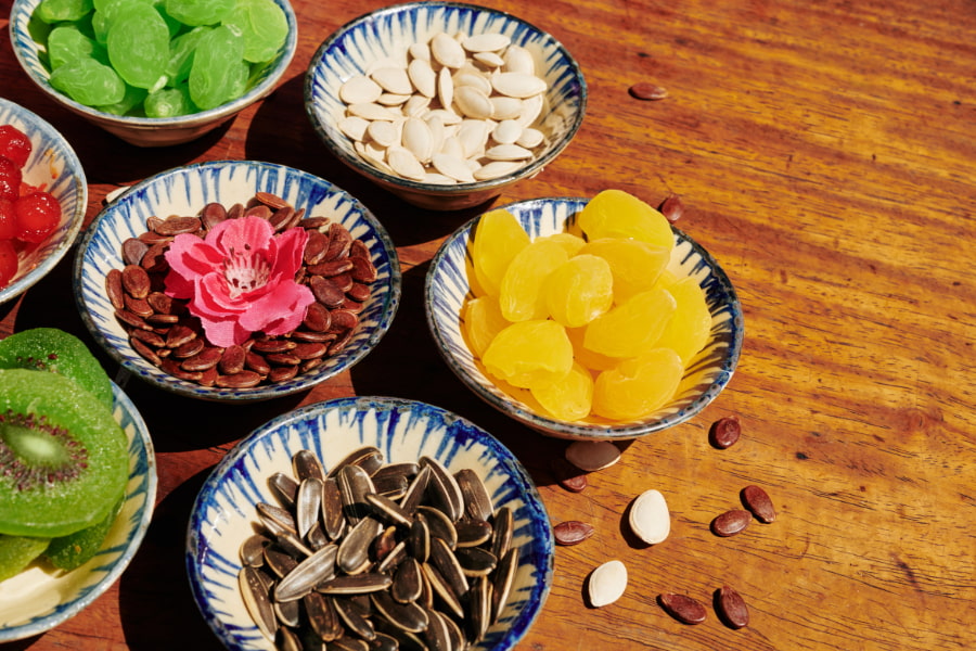 Bowls of dried fruits and seeds