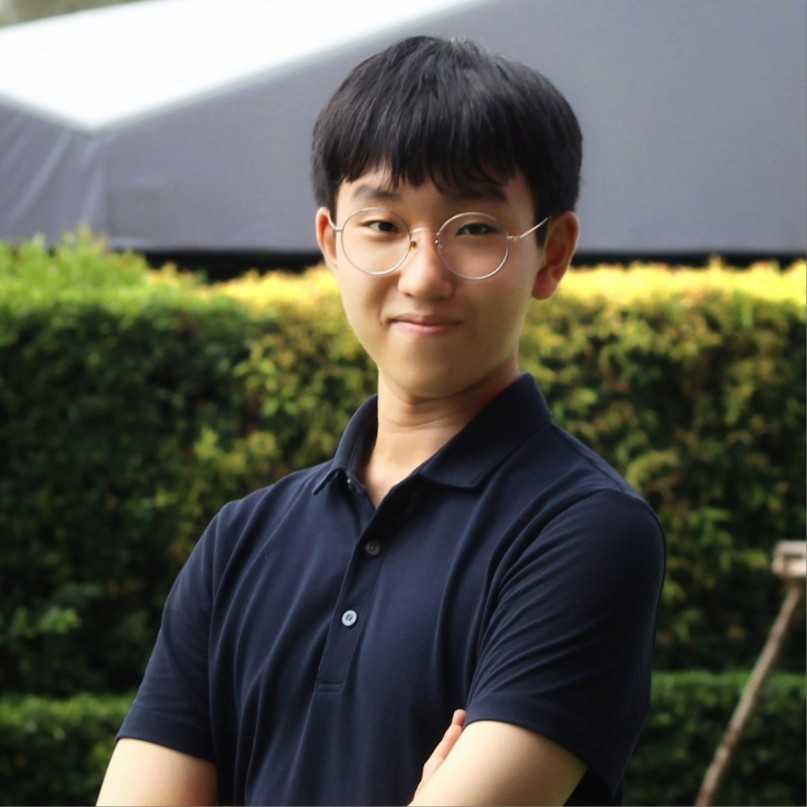 A boy wearing a navy polo