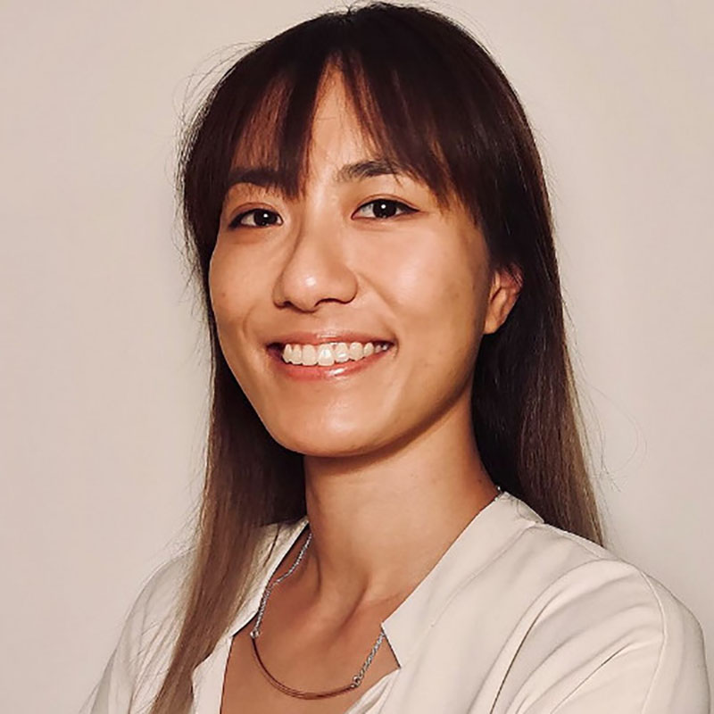 a headshot of a woman smiling 