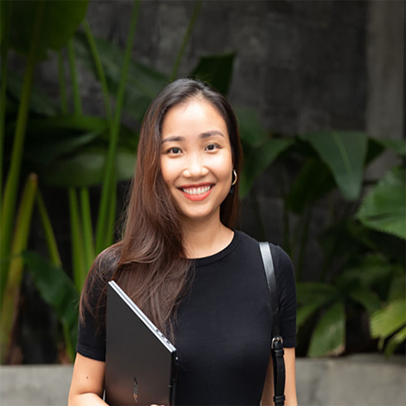 a headshot of a woman smiling 