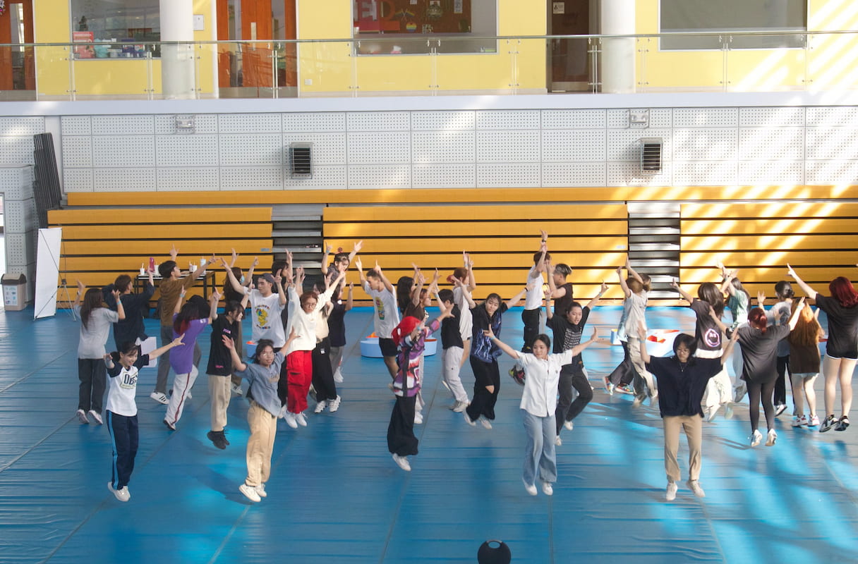 group of students dancing together